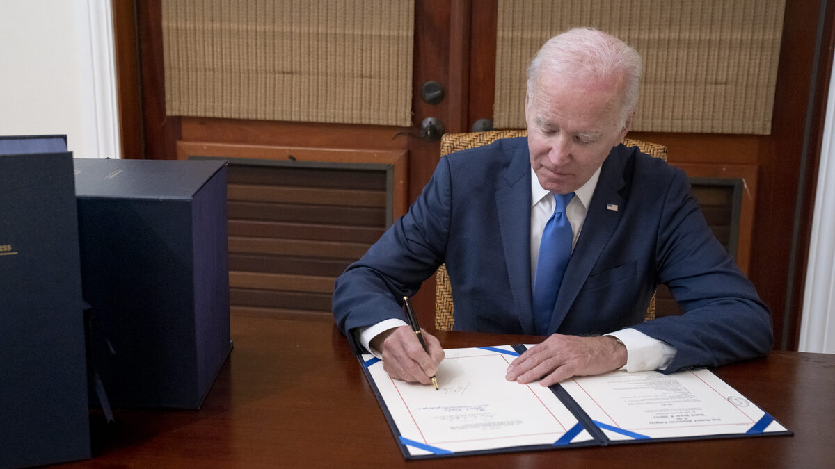 Biden signing bipartisan spending bill