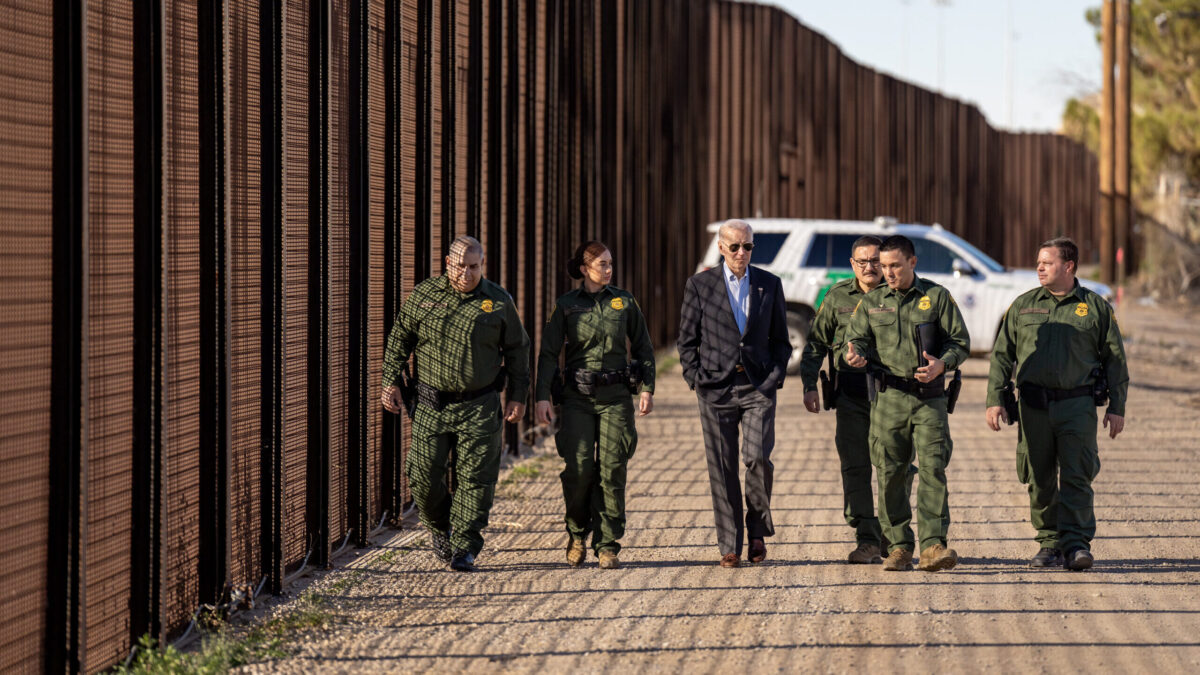 Biden walks along border wall