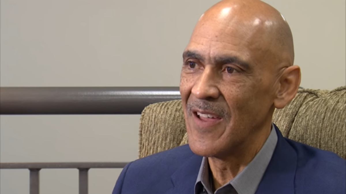 Tony Dungy discussing his faith during an interview