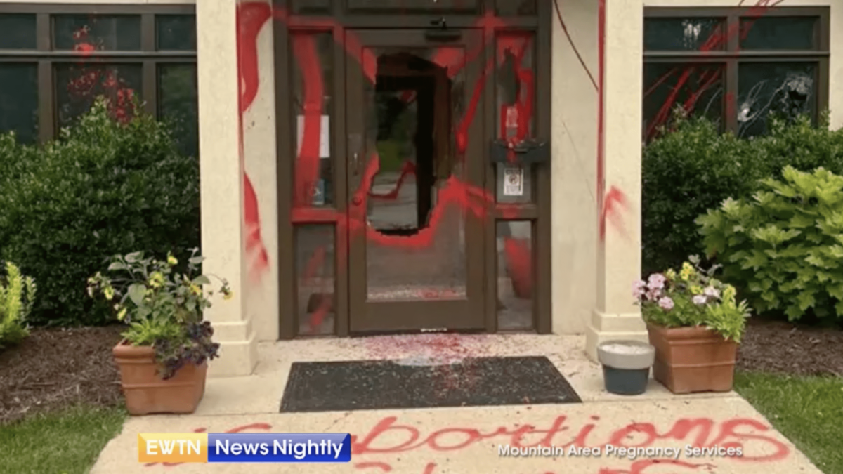 Attacks on an entrance to a crisis pregnancy center, vandalized with red paint