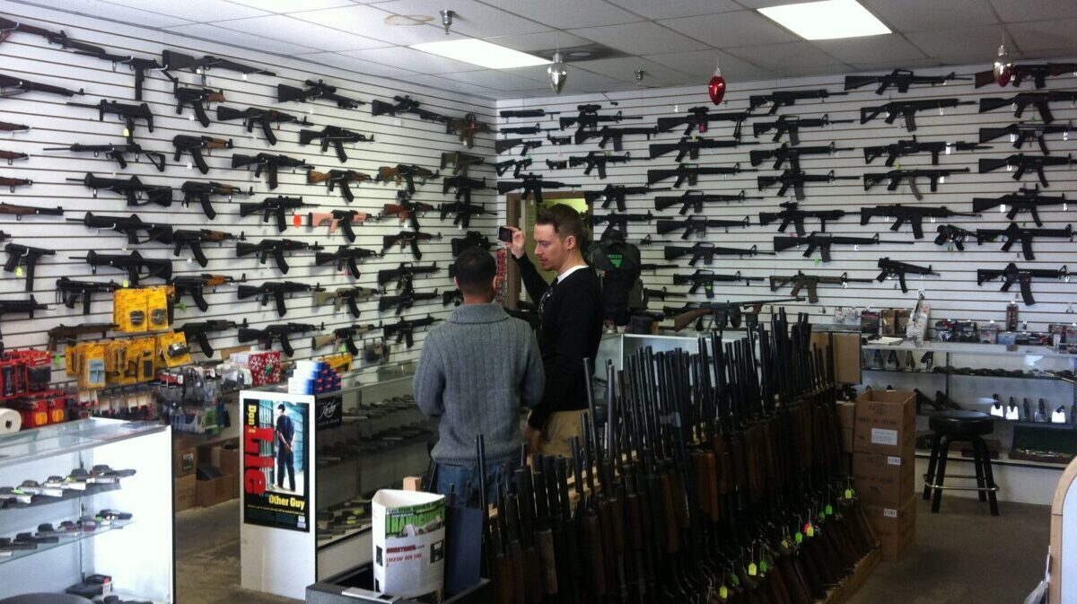so-called assault weapons hanging on the wall of a gun shop