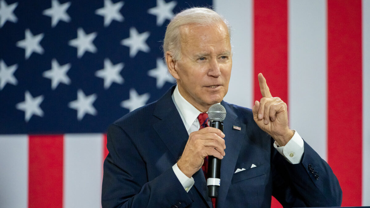 Joe Biden gives speech in front of American flag