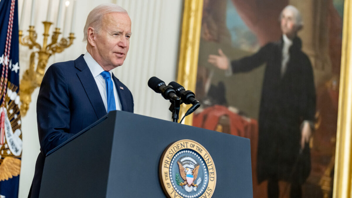 Joe Biden speaking behind podium