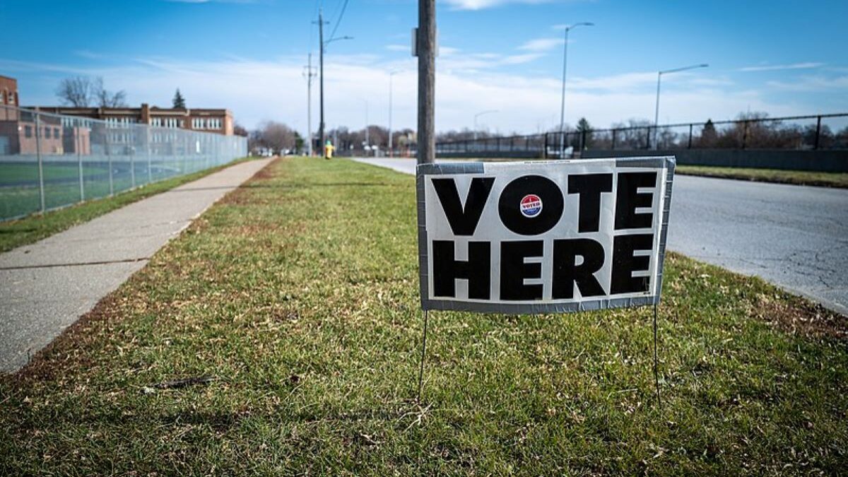 A "vote here" sign outside a precinct on Election Day