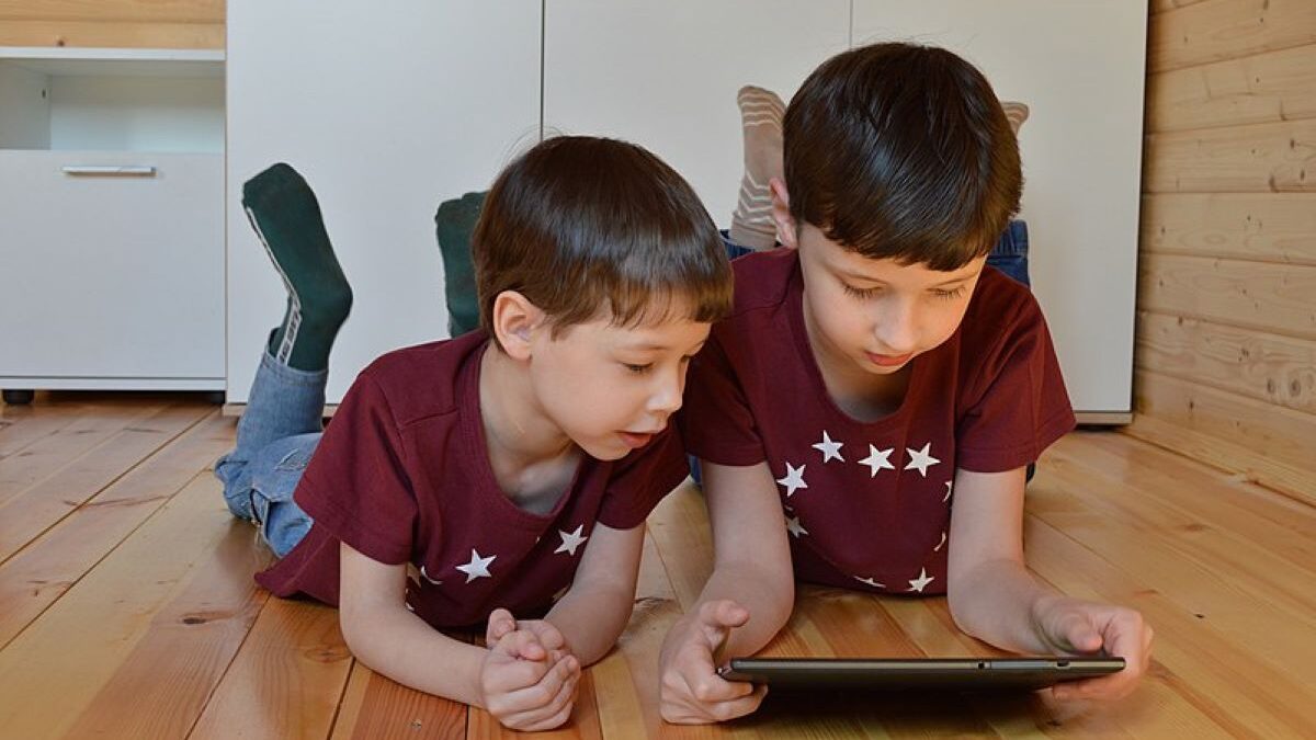 Children playing on a tablet