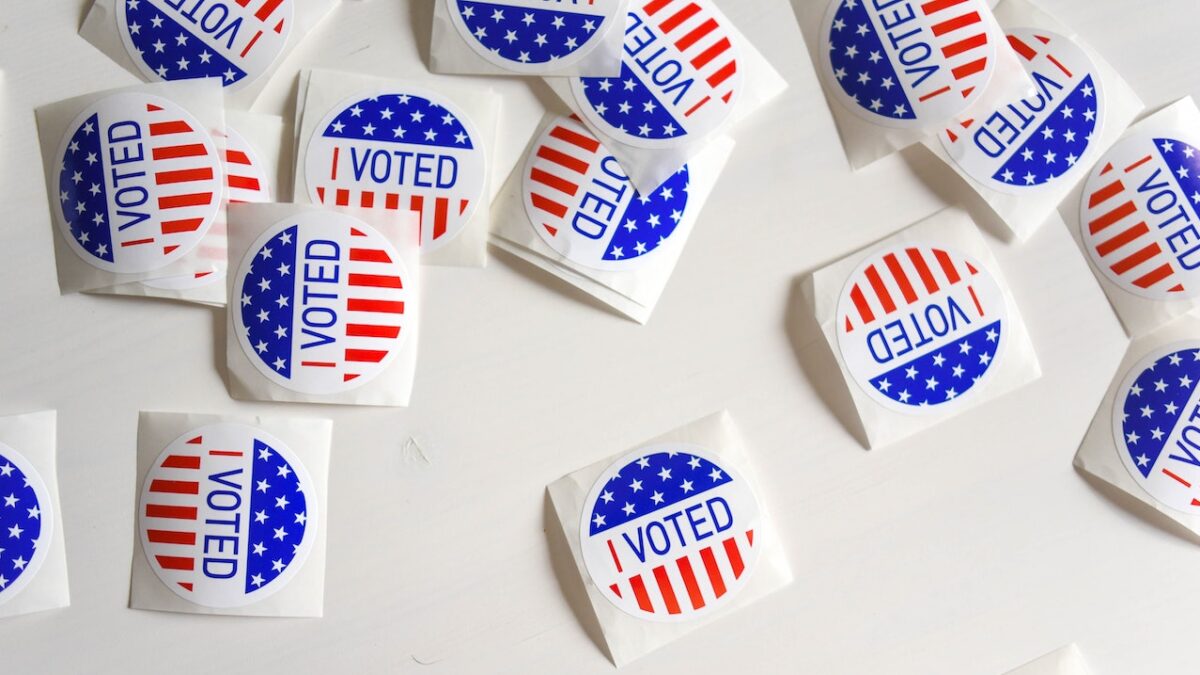 I voted stickers scattered on white background