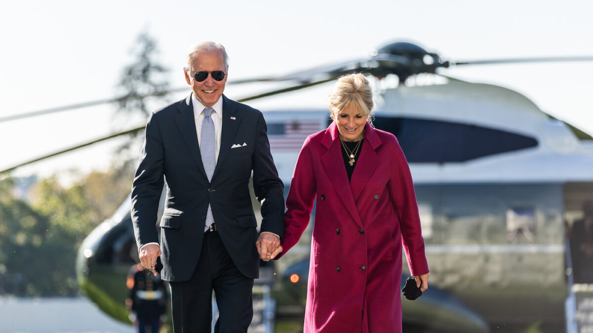 Joe and Jill Biden walking from helicopter