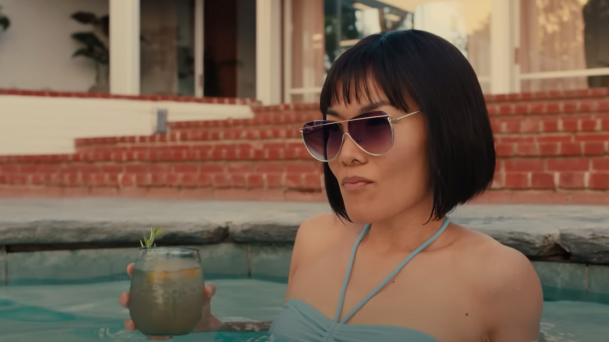 Netflix's Beef trailer shows woman in a pool holding a drink