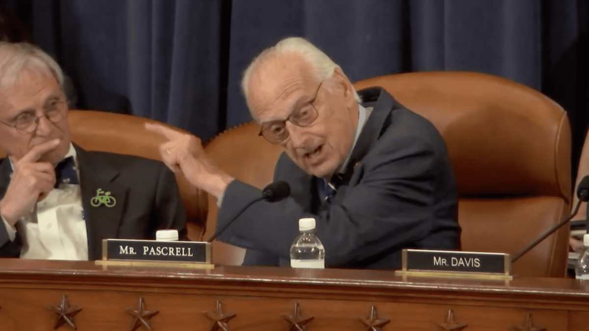 angry old man pointing his finger in congressional hearing