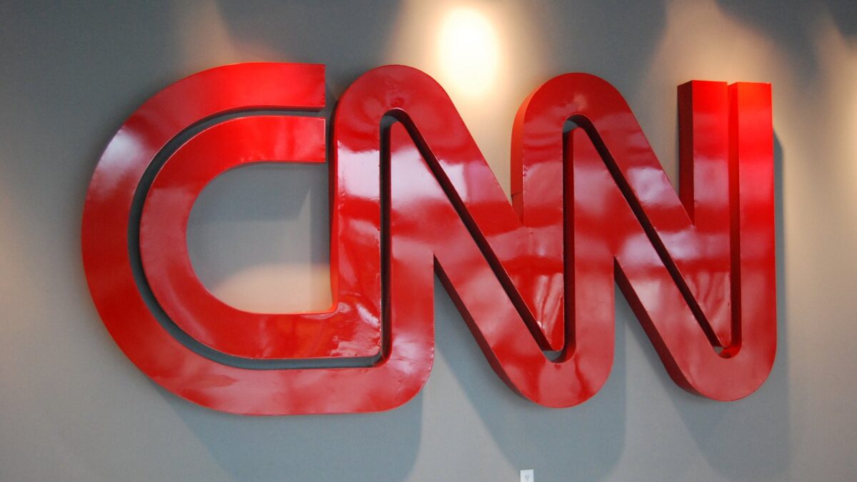 a CNN logo on a wall