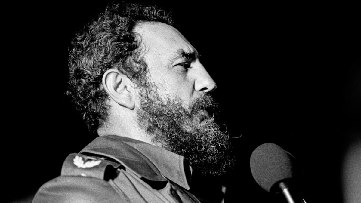 Black and white, Fidel Castro at a microphone.