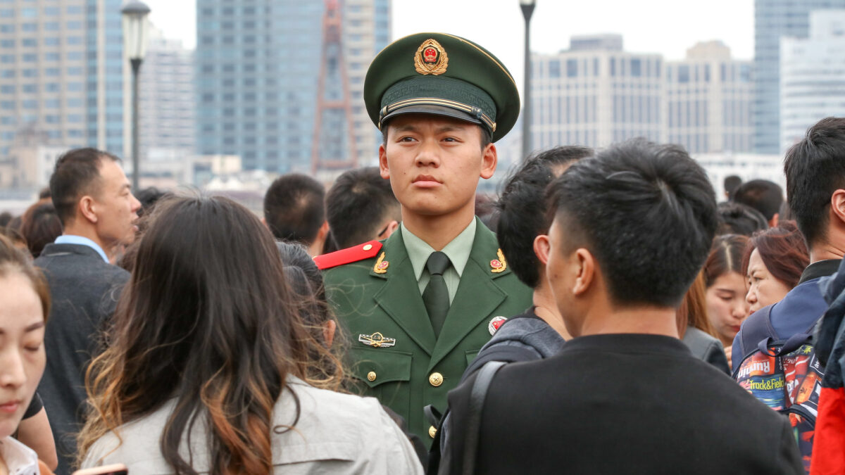 chinese police man in crowd