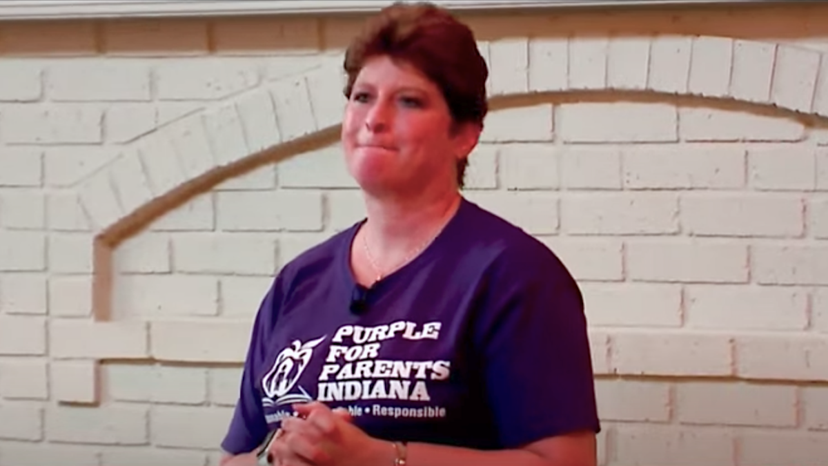 Woman in Purple for Parents Indiana shirt