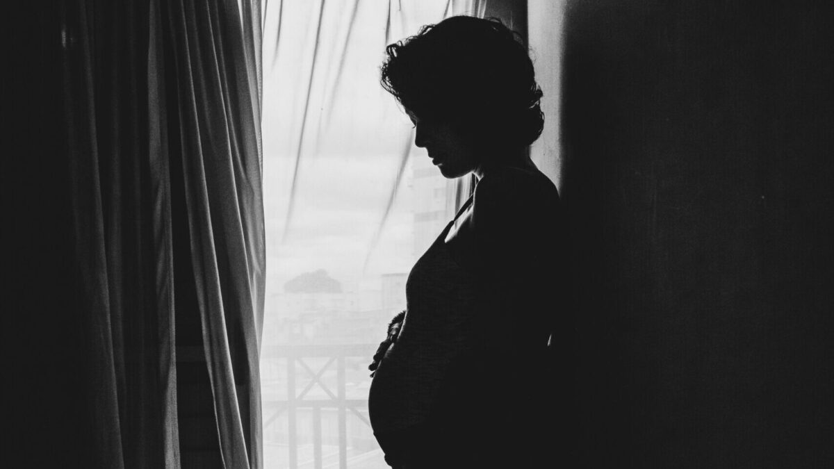 pregnant woman in black and white