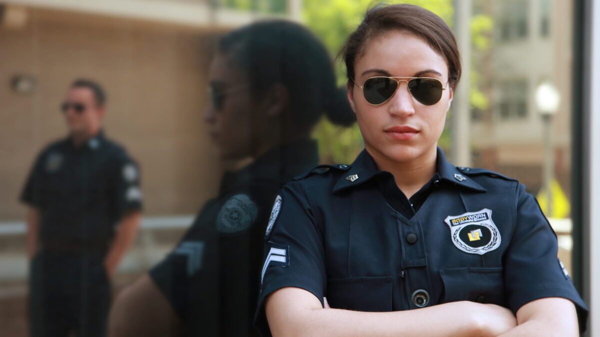 Woman police officer with sunglasses