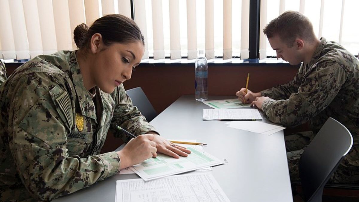 Navy sailor taking military exam