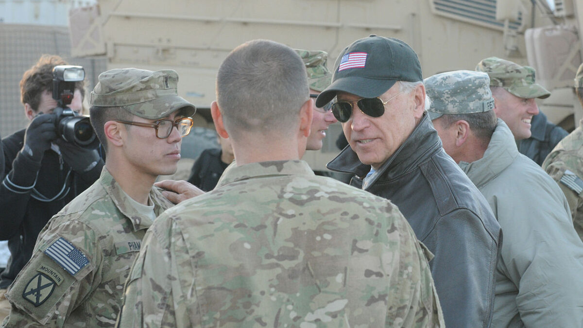 U.S. Army 1st Lt. Andrew Pham (left), a platoon leader from Brooklyn, N.Y., assigned to Troop A, 3rd Squadron, 89th Cavalry Regiment, 4th Brigade Combat Team, 10th Mountain Division’s Task Force Slugger, meets with Vice President Joseph Biden during Biden’s visit to Forward Operating Base Airborne in eastern Afghanistan Jan. 11.