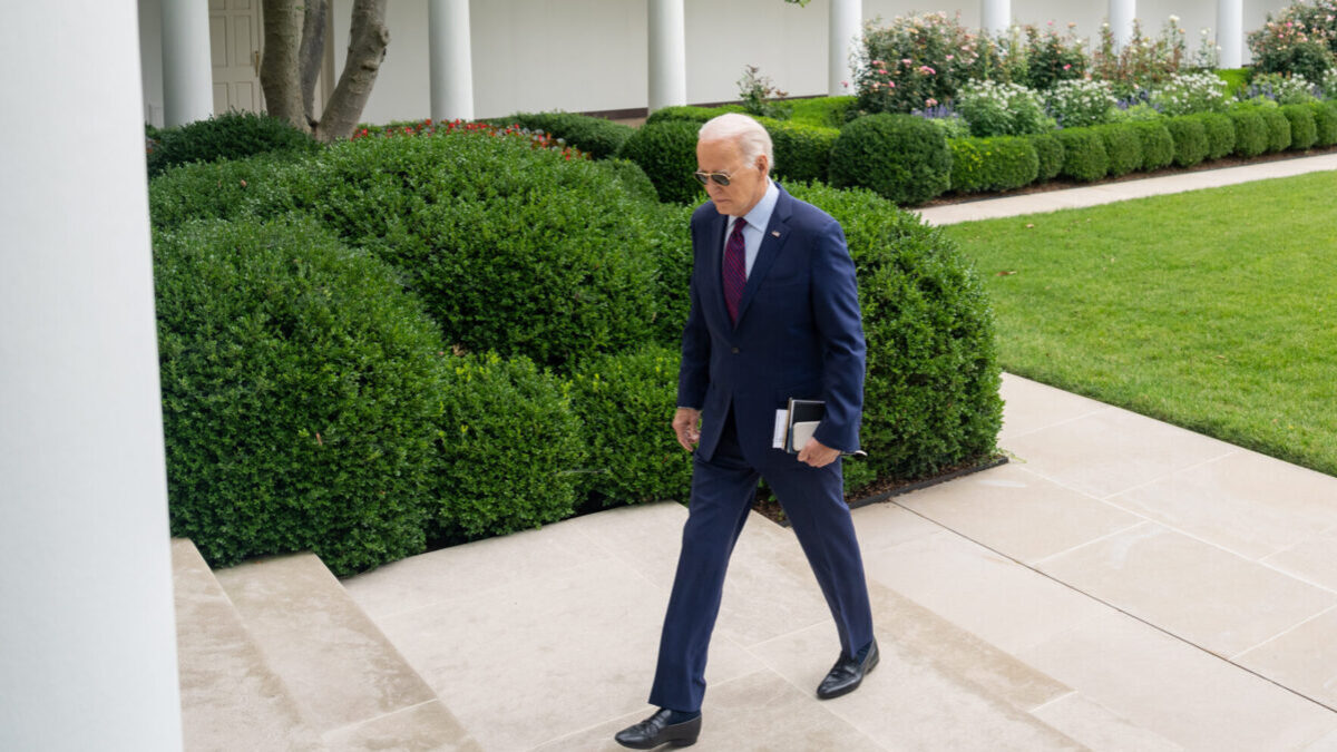 Joe Biden walks across White House lawn