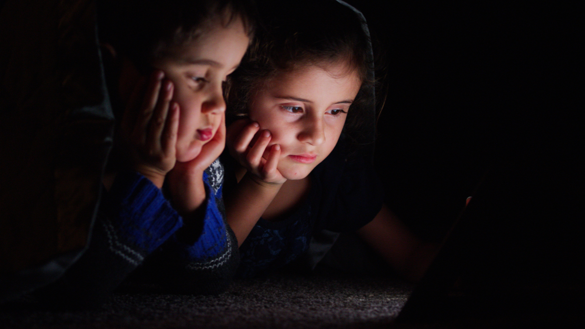 kids looking at a screen