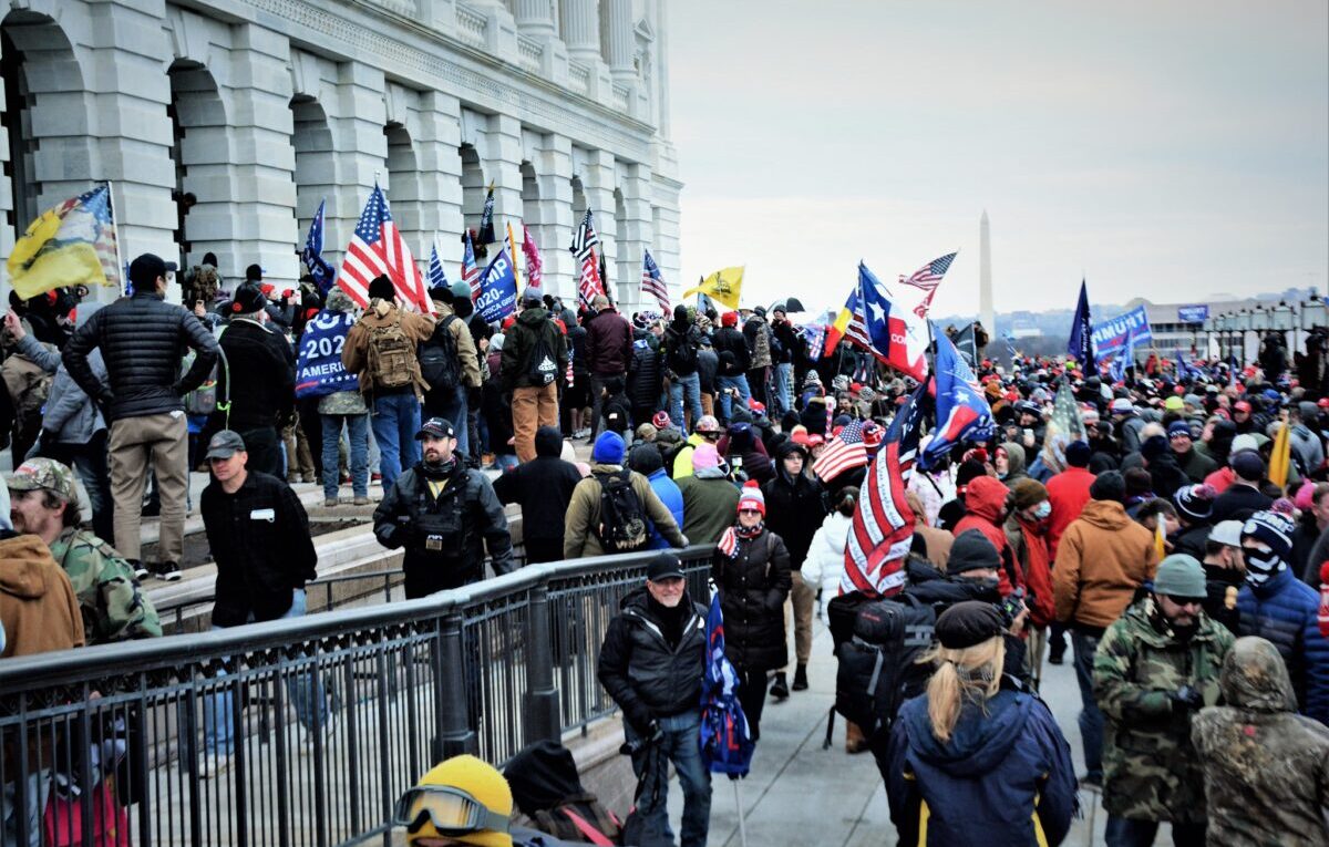 J6 Tapes Show Police Escorting, Fist-Bumping Protesters At Capitol