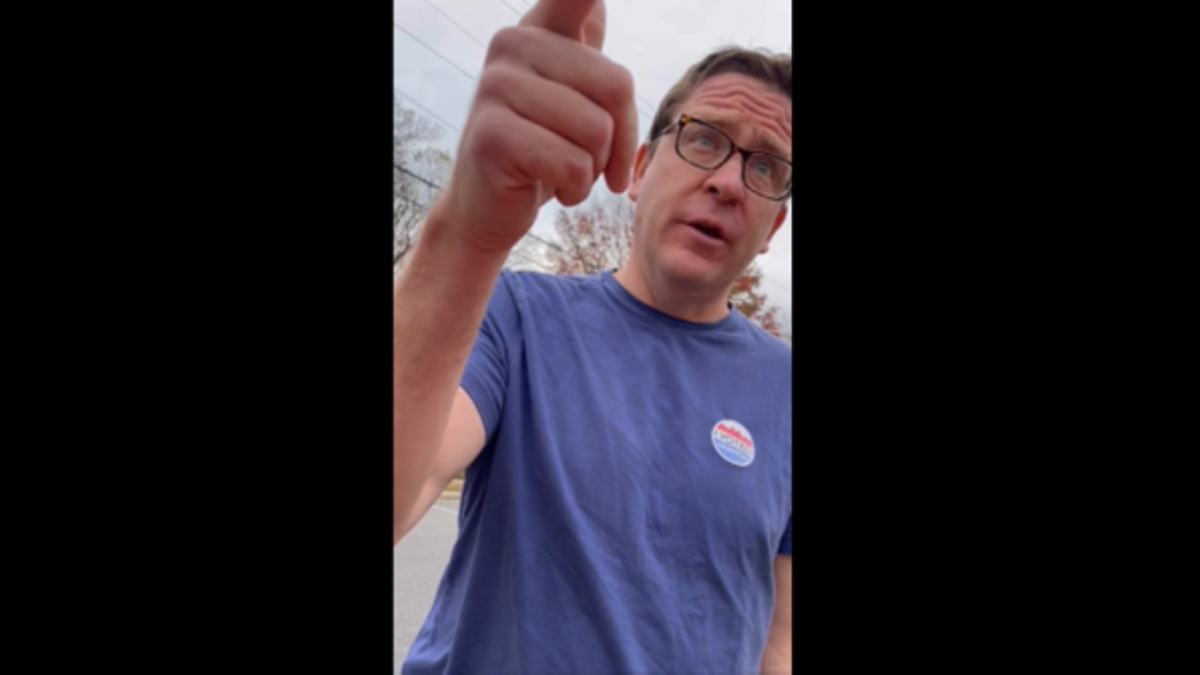 Democrat voter harassing a GOP poll watcher