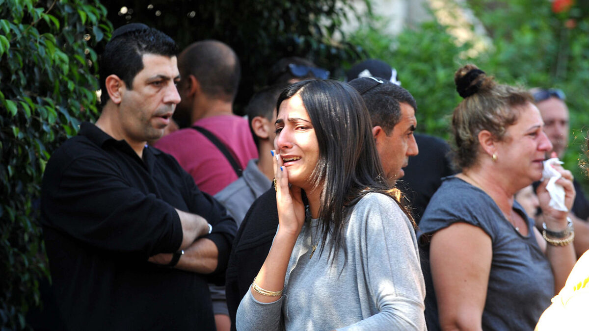 Israel woman cries after Hamas attack
