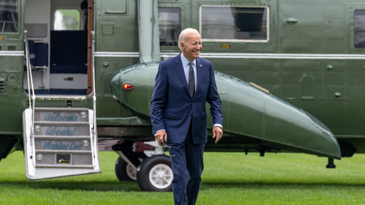 Joe Biden walks in front of Marine One