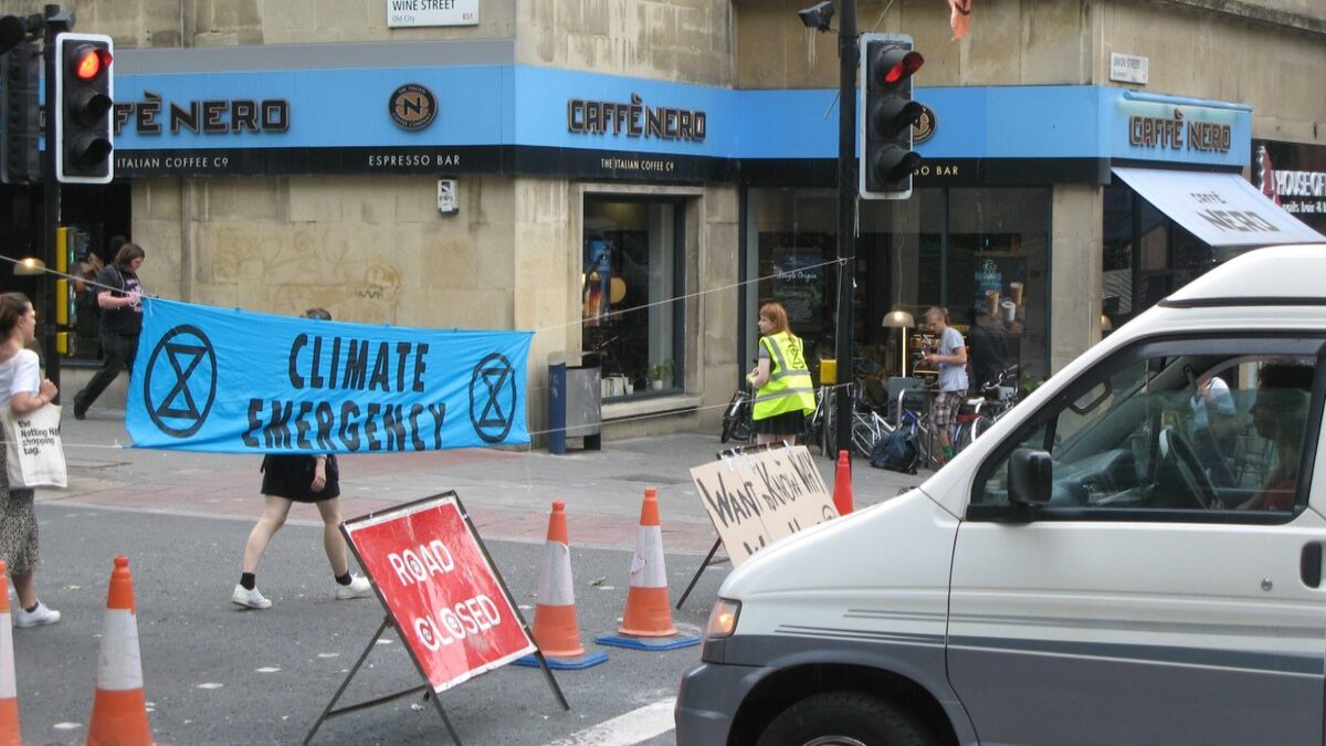 Climate protestors blocking traffic.
