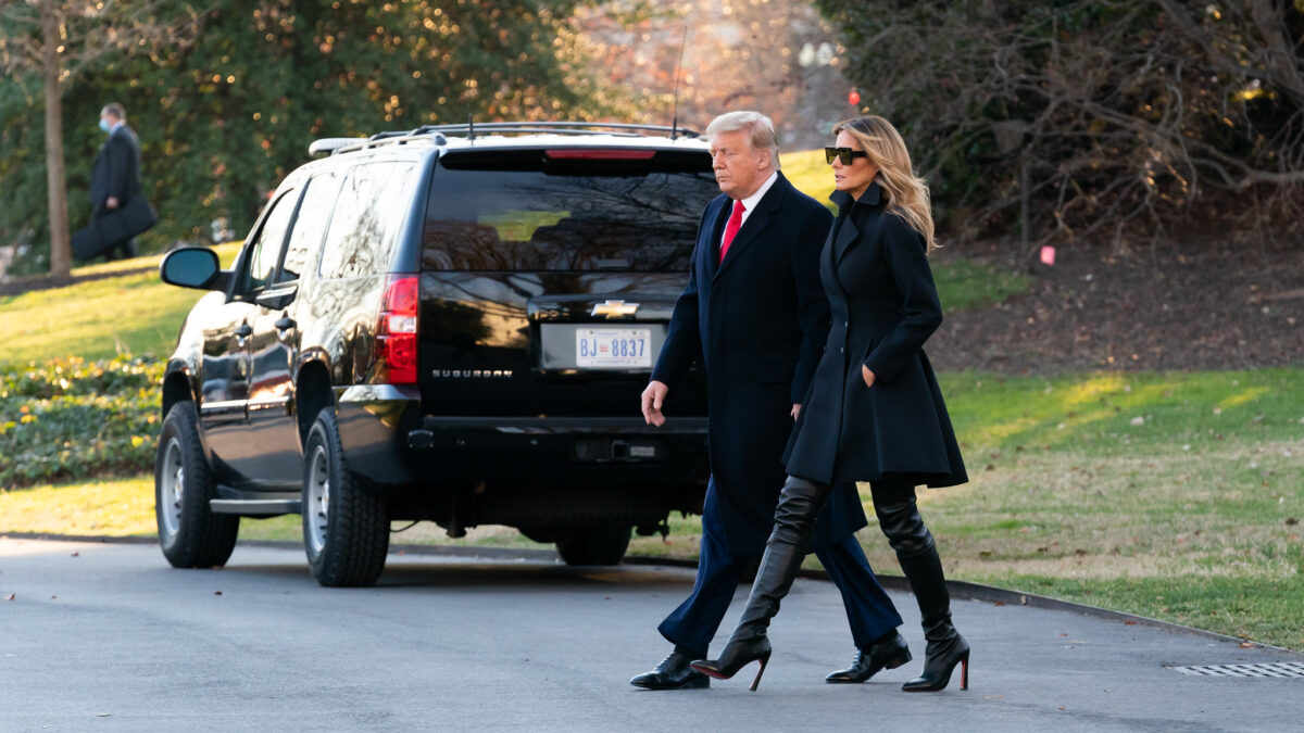 Donald and Melania Trump walking