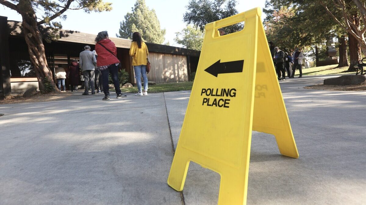 yellow polling place easel