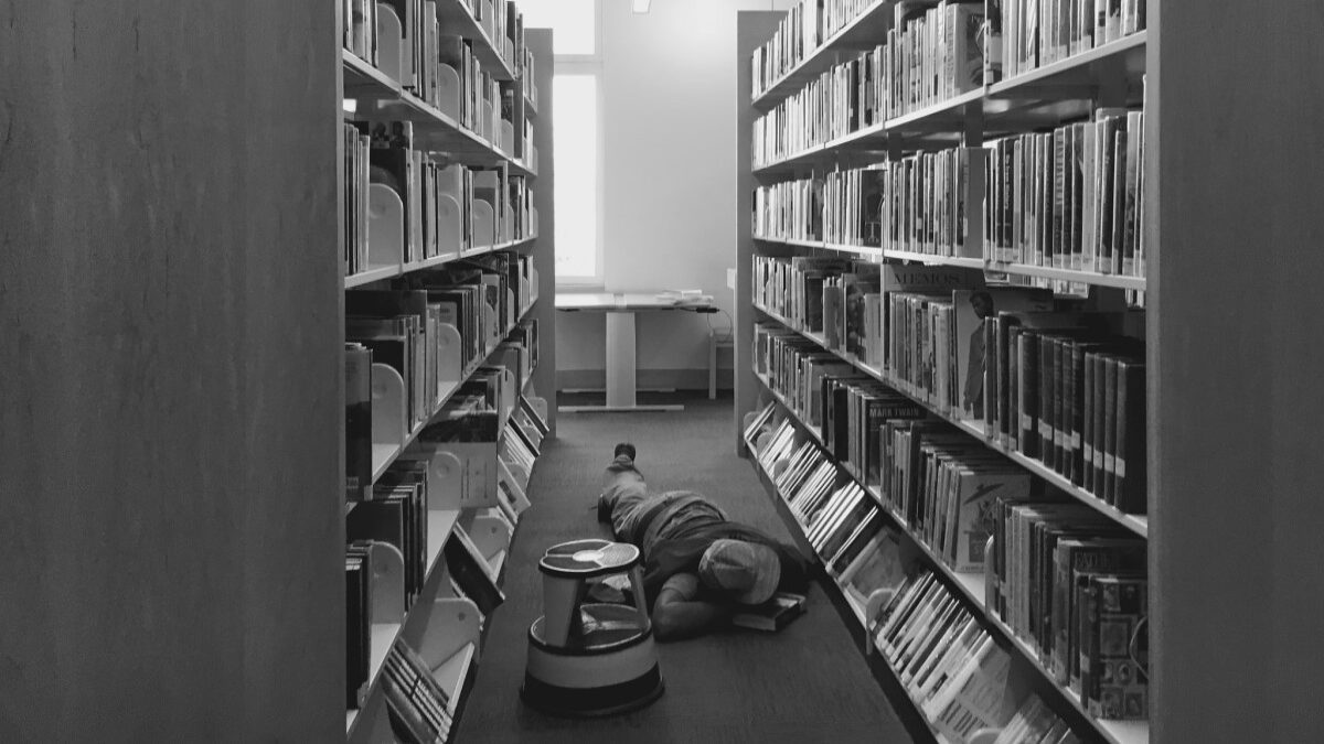 homeless person in a library