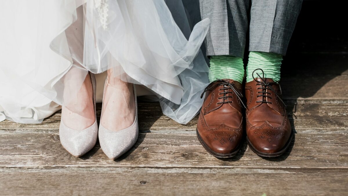 close up of bride and groom's shoes