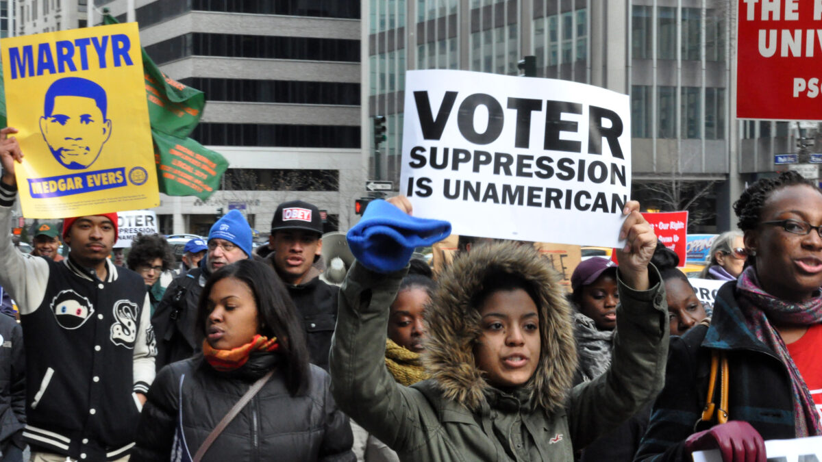 Protesters marching against what they perceive to be voter suppression.