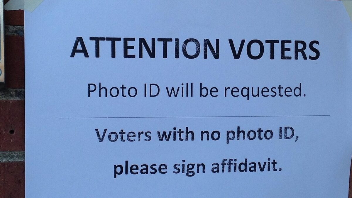 Sign in New Hampshire requiring photo ID