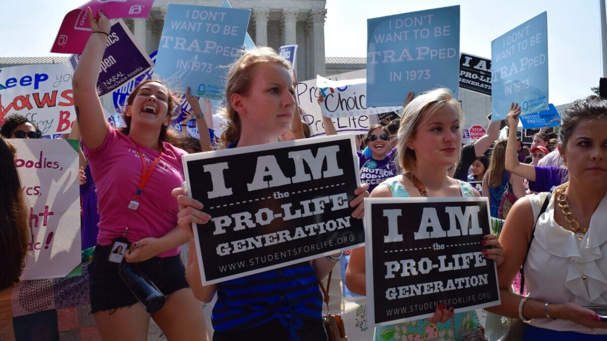 Pro-Life activists holding signs
