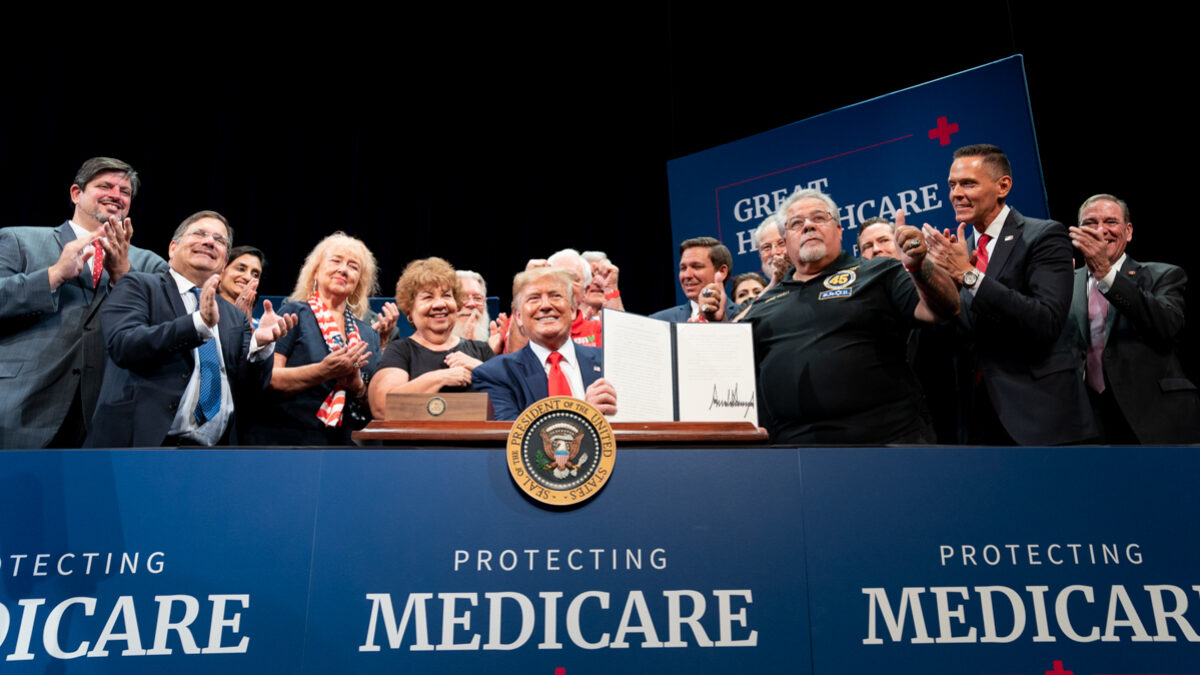 President Donald J. Trump displays his signature on an Executive Order Protecting and Improving Medicare for our Nation’s Seniors Thursday, Oct. 3, 2019, at the Sharon L. Morse Performing Arts Center at The Villages, FL. (Official White House Photo by Shealah Craighead)