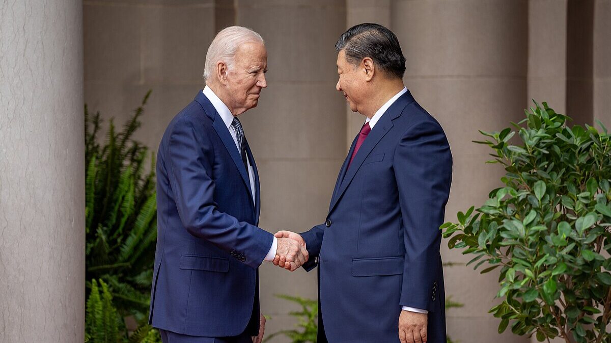 Biden shaking hands with Xi.