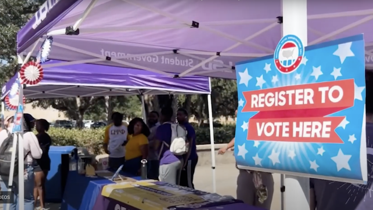 A voter registration tent on the LSU campus.