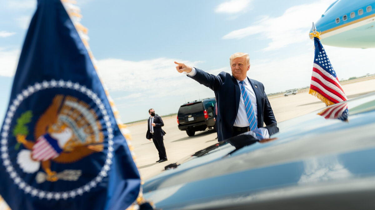 Trump points while walking to limo