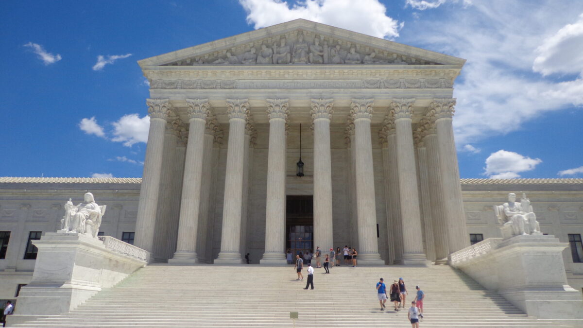 U.S. Supreme Court building on a sunny day.
