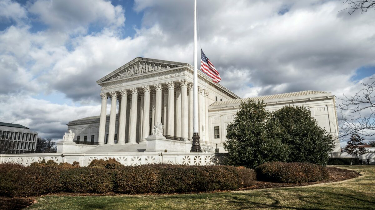 Supreme Court with flag at half mast out front