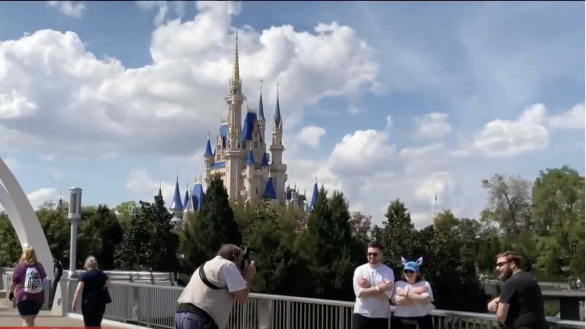 Tourists take in Disney World in Orlando, Fla.