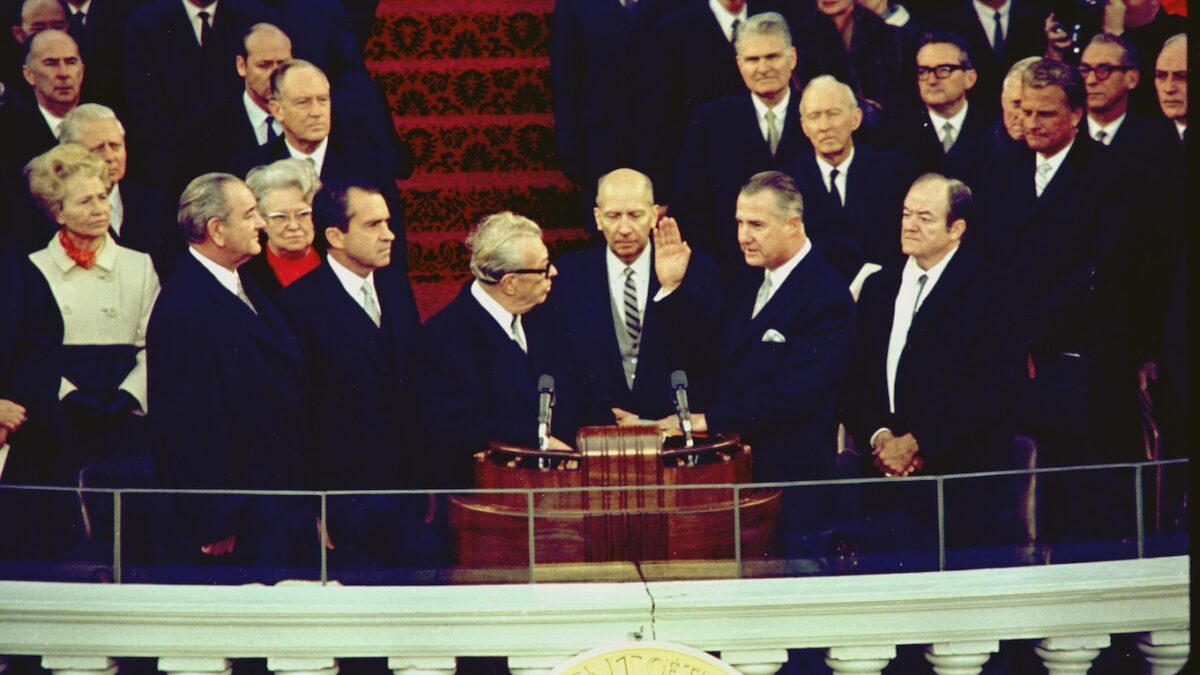 Spiro Agnew take oath of office as VP, Nixon stands off to the side