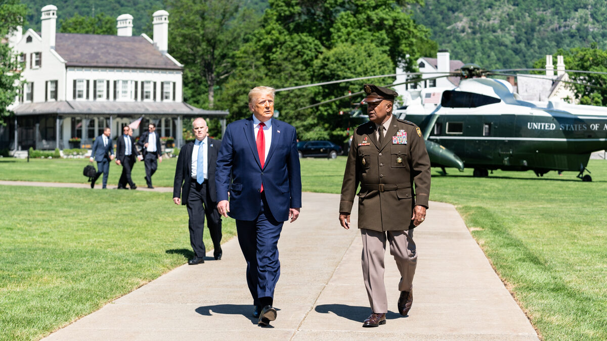 President Trump walks with LTG at USMA Graduation