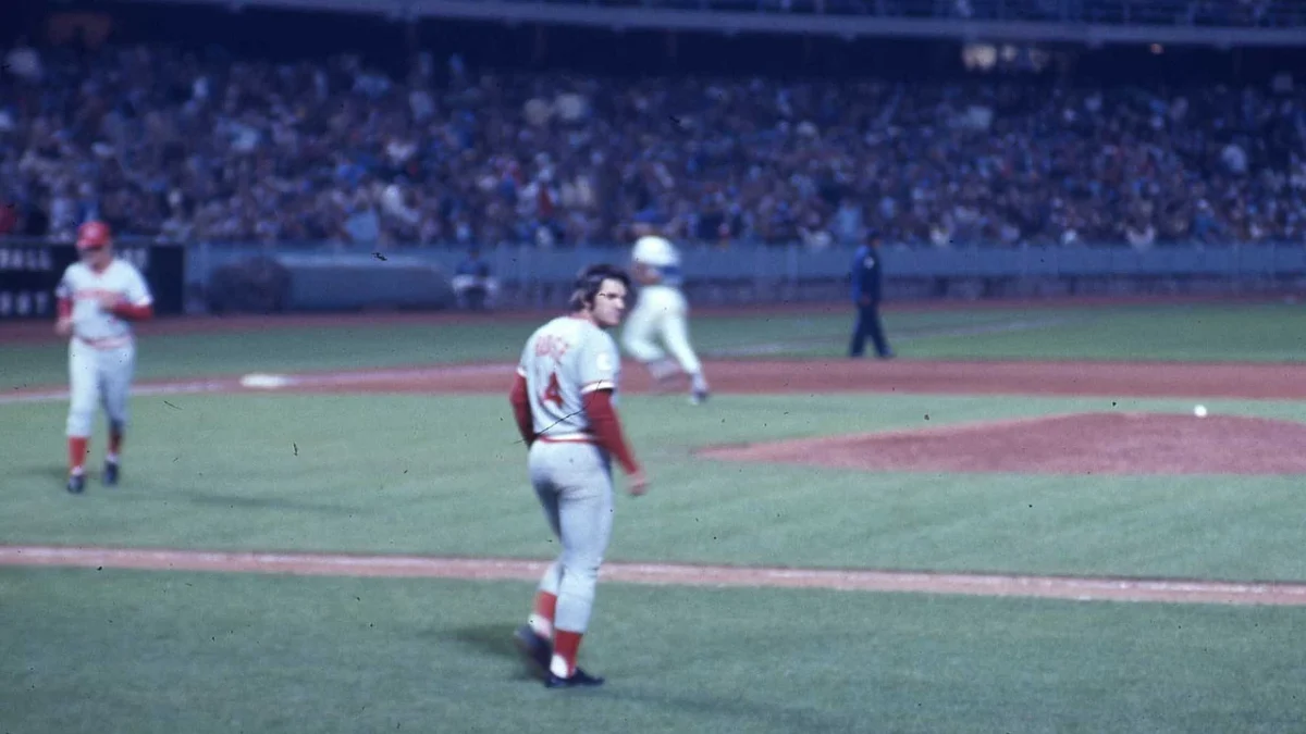 Pete Rose waling onto the field