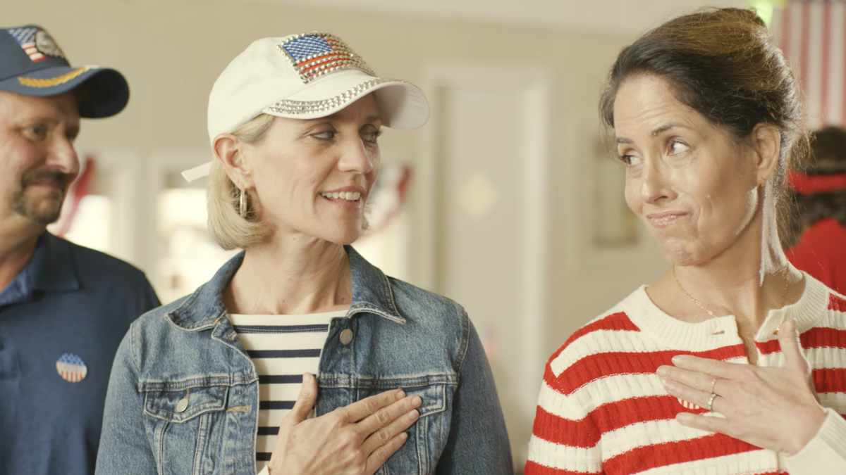 women looking at each other after voting