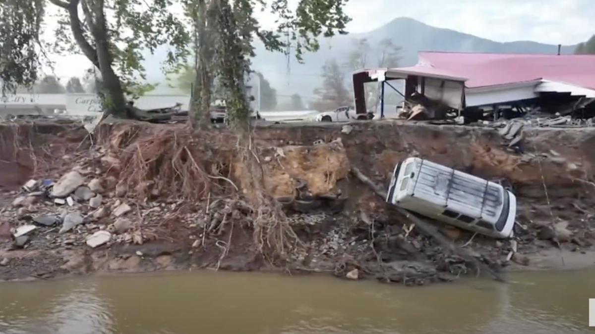 Vehicles turned over in he devastation of Hurricane Helene in North Carolina