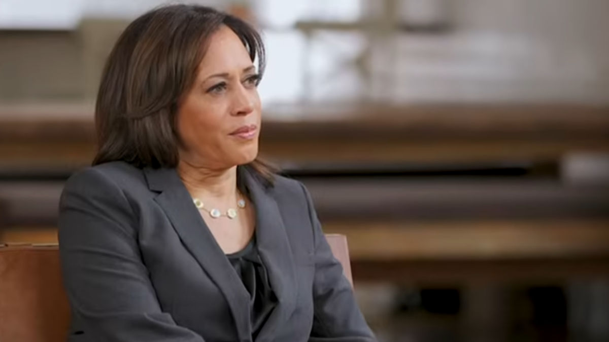 Kamala Harris sitting on bench