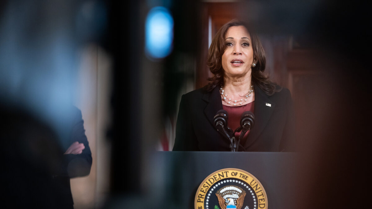 Kamala Harris speaks behind podium