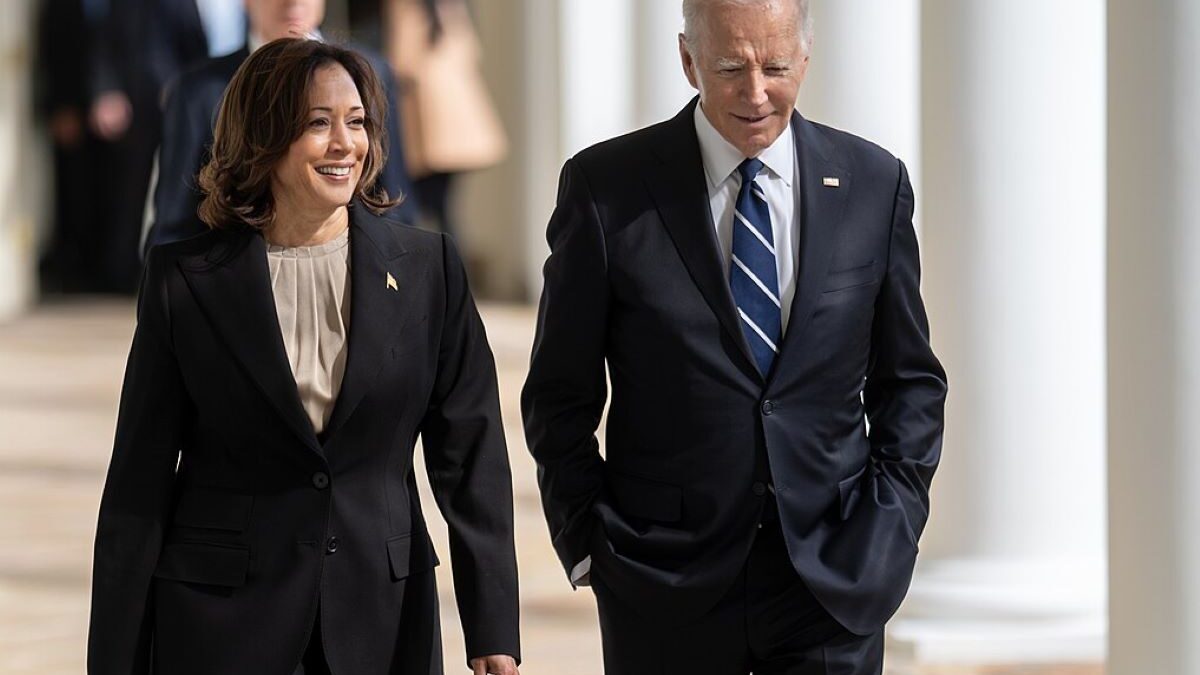 Joe Biden and Kamala Harris walking.